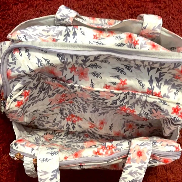 Ju-ju-be babybag, floral pattern typically for a girl.